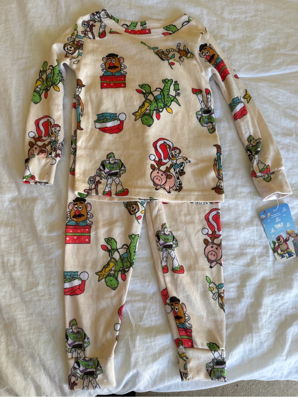 Disney Cream Toy Story Holiday Pajama Set with Colorful Character Prints